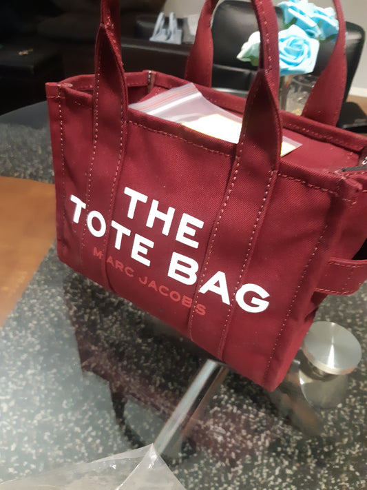MARC JACOBS MINI TOTE BAG  $180