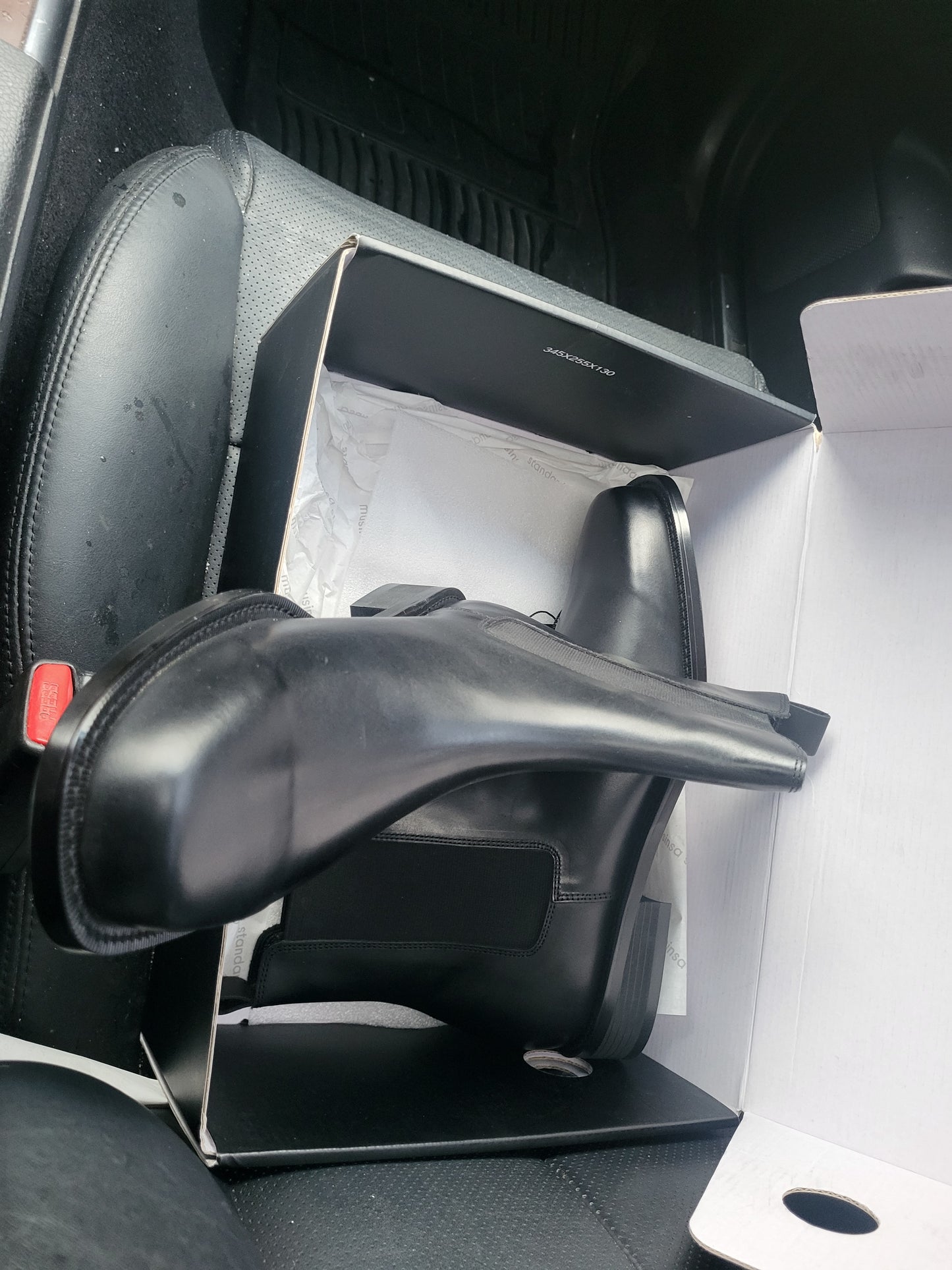 CHELSEA BOOTS . BLACK  LEATHER BOOTS AVAILABLE FOR  $ 79.00. SIZE 9.5 BUT FITS LIKE A U.S / CAN 10